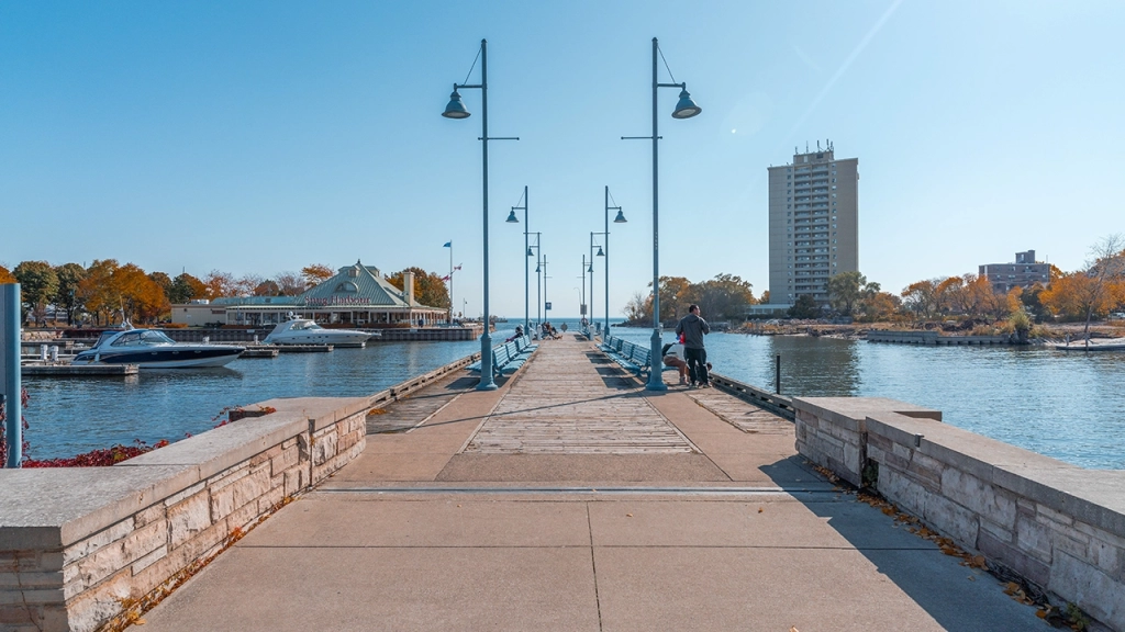 An image of the pier in Port Credit, Mississauga which feeds into Port Credit Harbour and Port Credit Marina at Lake Ontario.