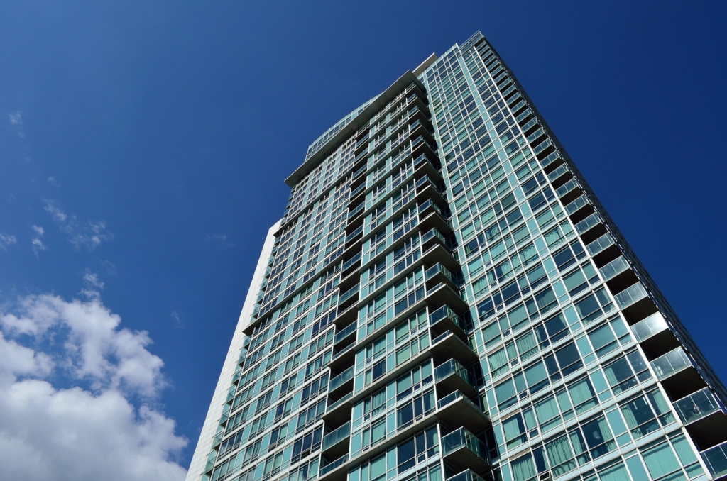 An image of a Toronto condo on clear blue day.