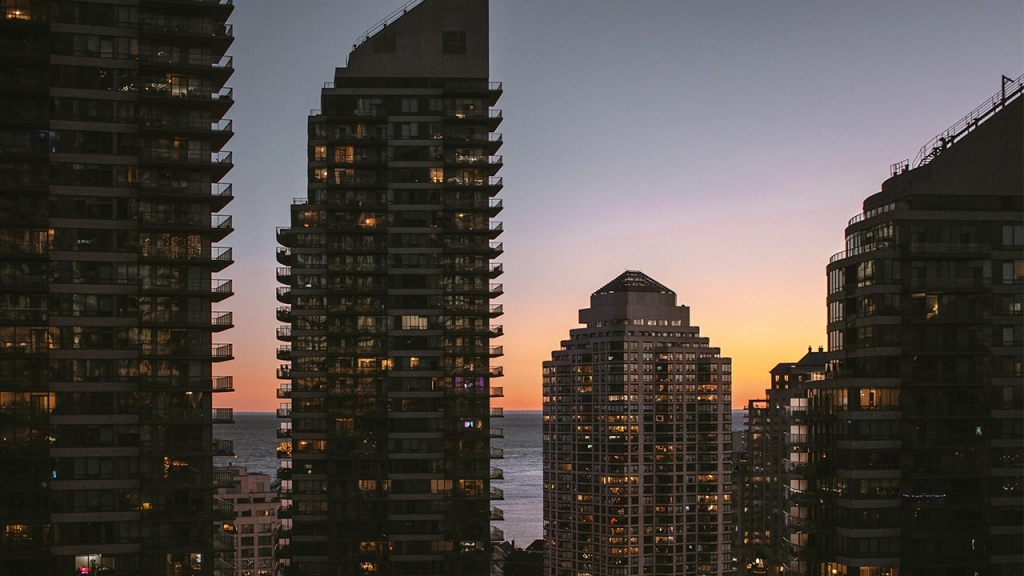 An image of condo buildings located in Etobicoke, Toronto during sunset.