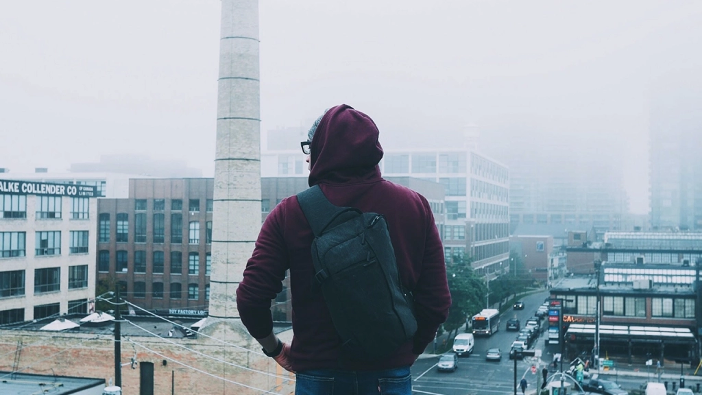 An image of a man overlooking Liberty Village in Toronto, Ontario, Canada.
