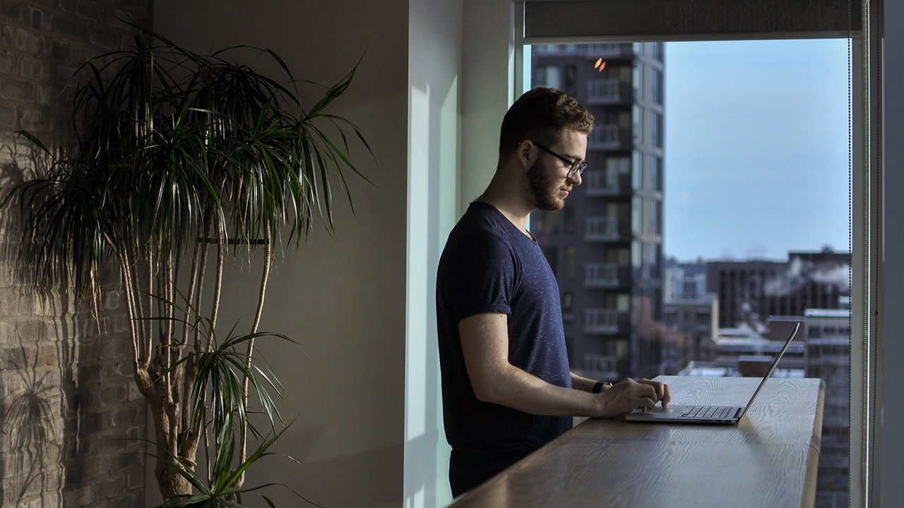An image of a first time home buyer in toronto wondering between buying vs. renting a condo.
