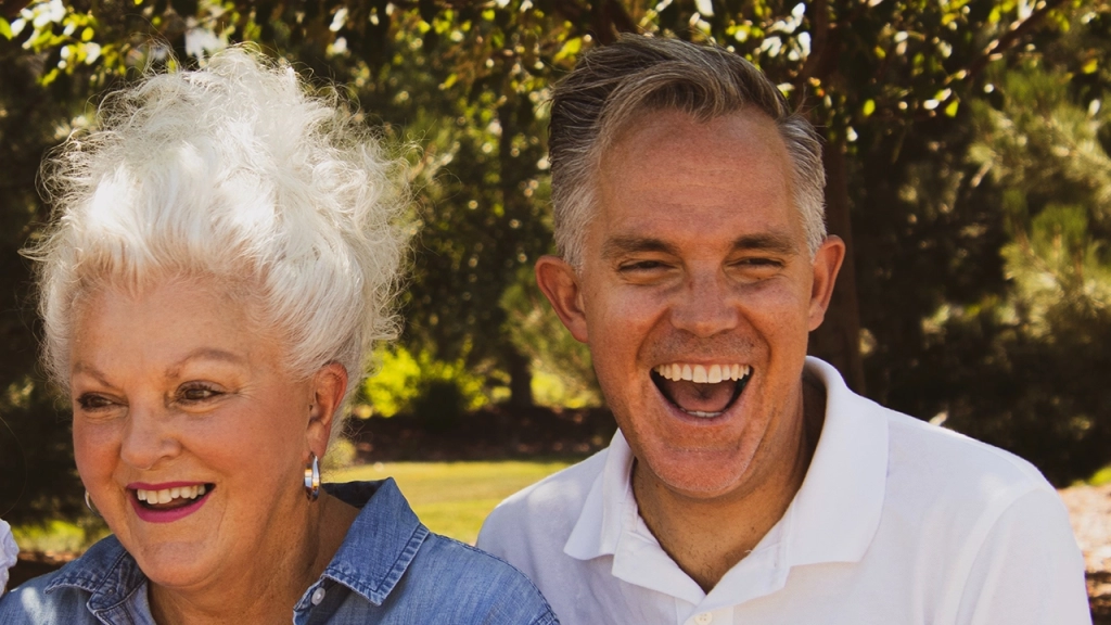 An image of two mature senior citizens looking to downsize for retirement.