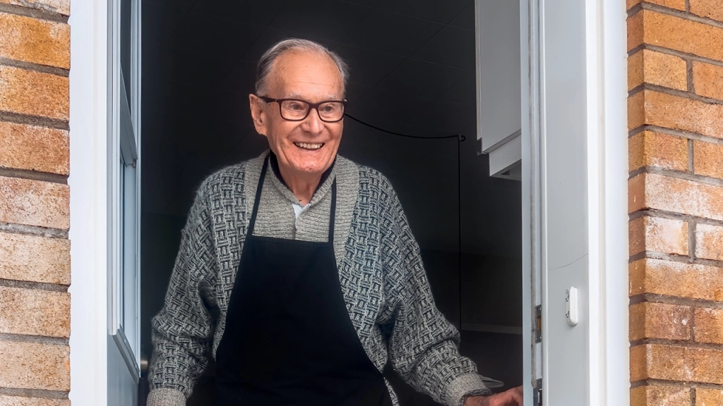 An older, retired senior gentleman settling into his new home.