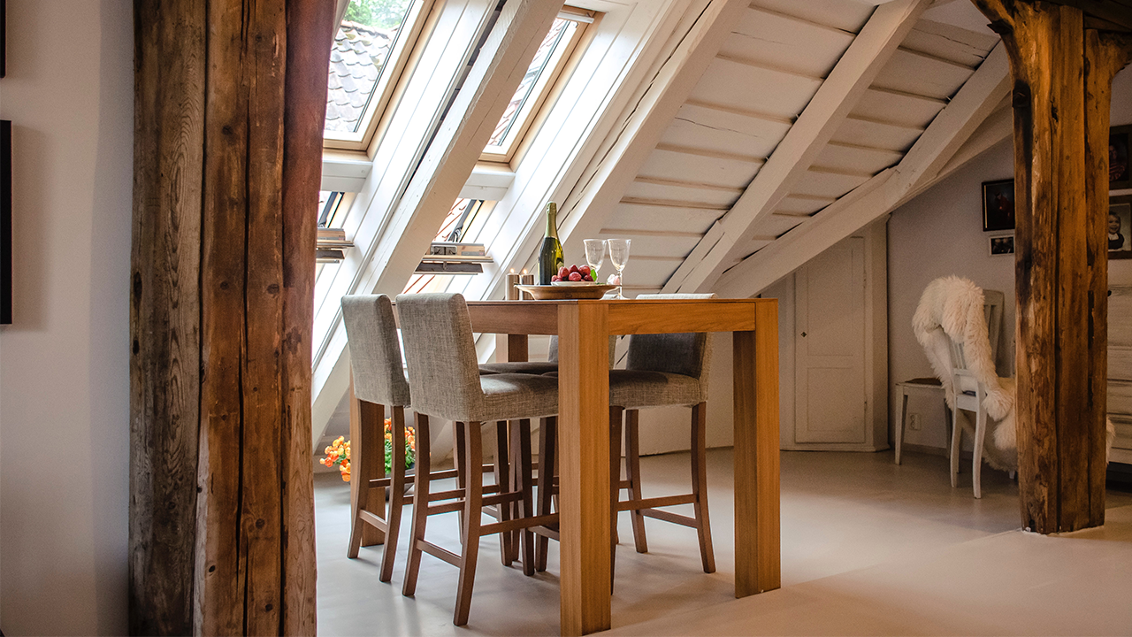 An interior image of a loft kitchen following the tips and tricks of these loft decorating ideas.