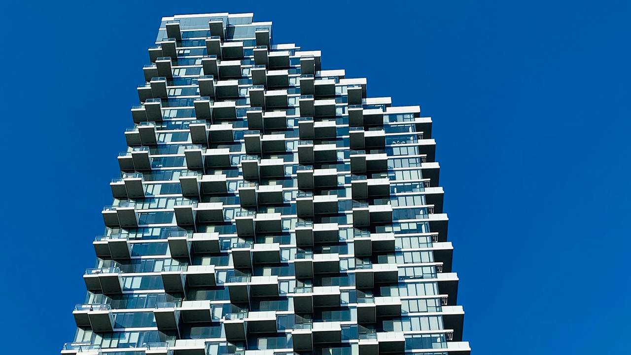 An image of a condo building which has a status certificate.