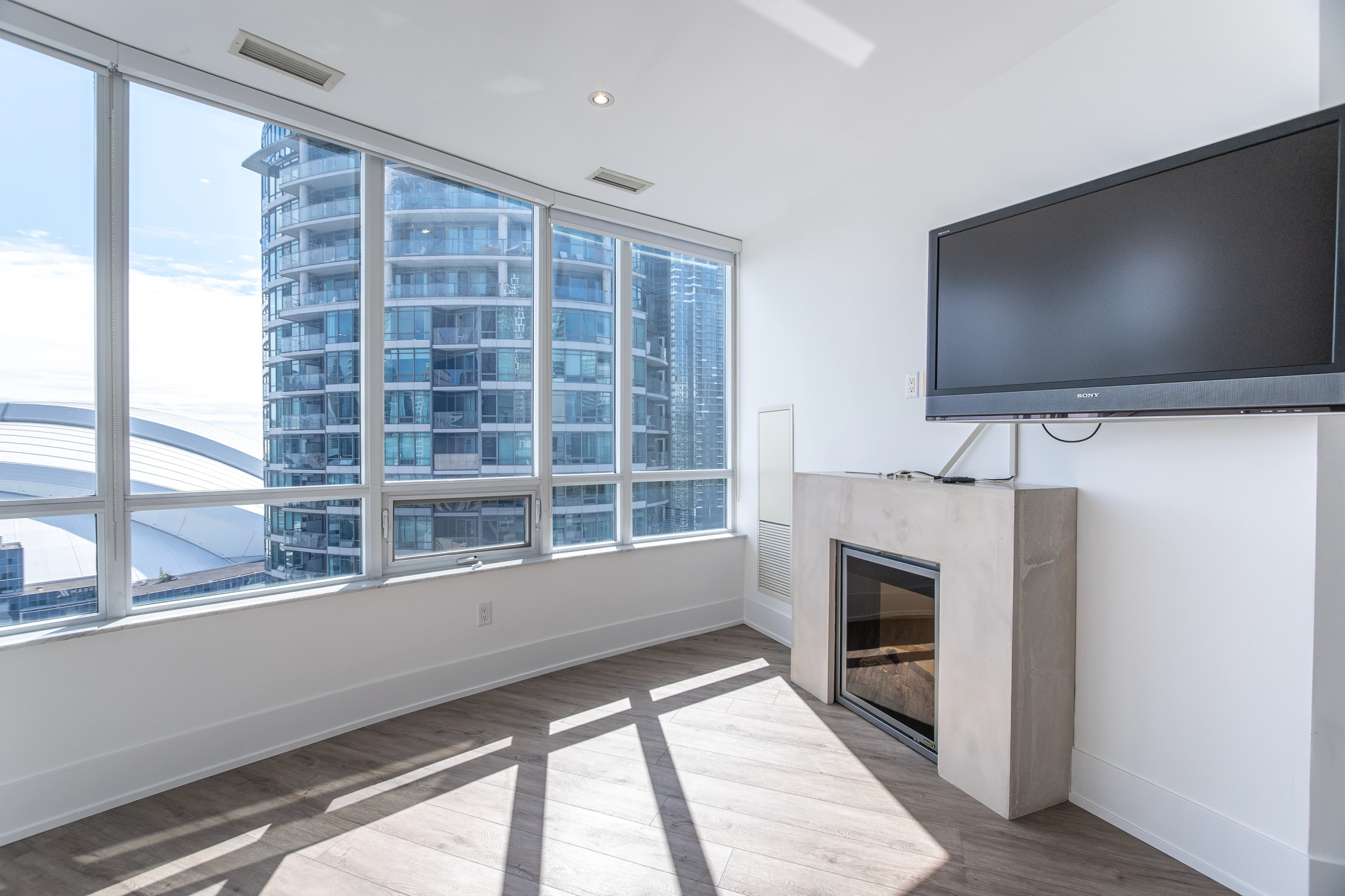 20 Blue Jays Way PH2 - primary bedroom with electric fireplace