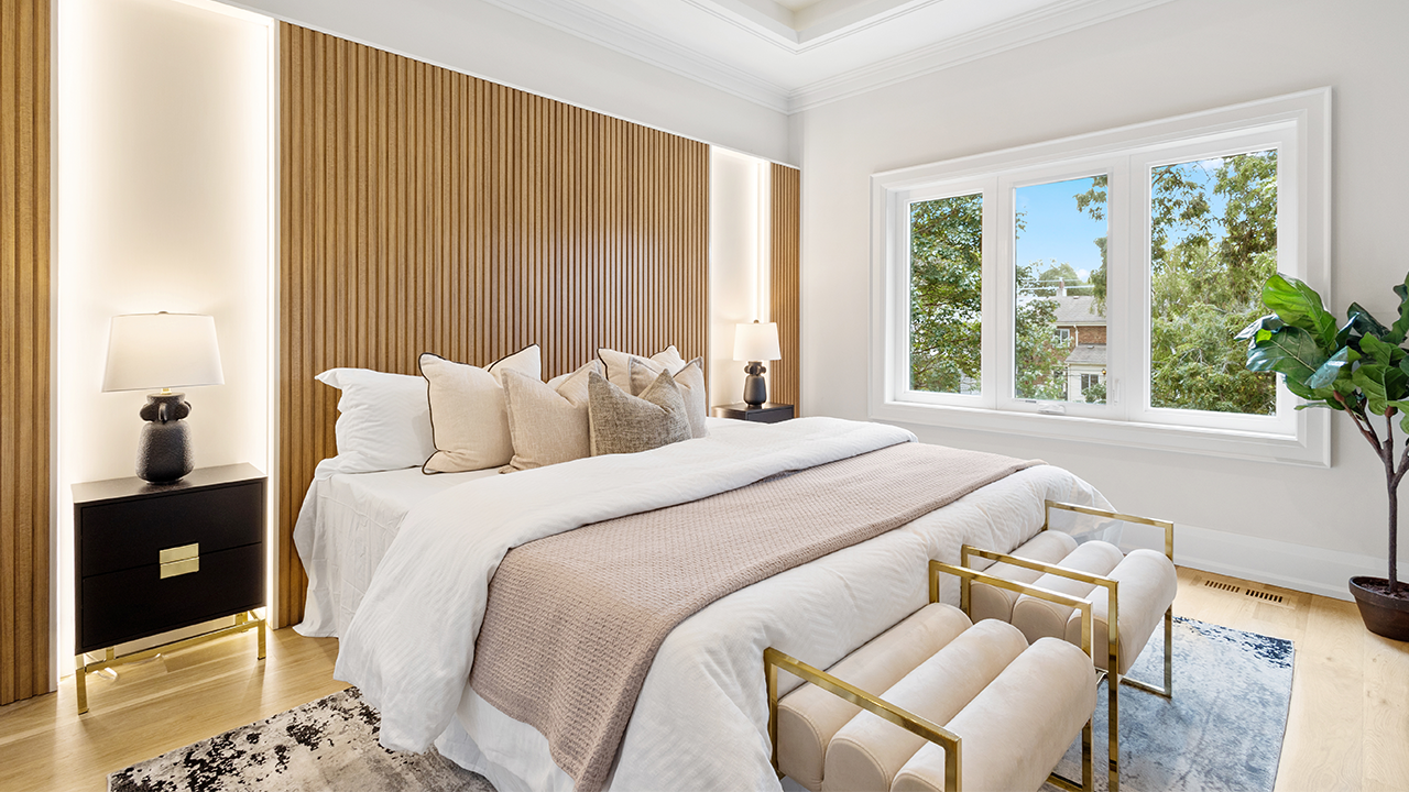 Interior bedroom of a luxury home. Professional real estate photography taken by Terracon Media