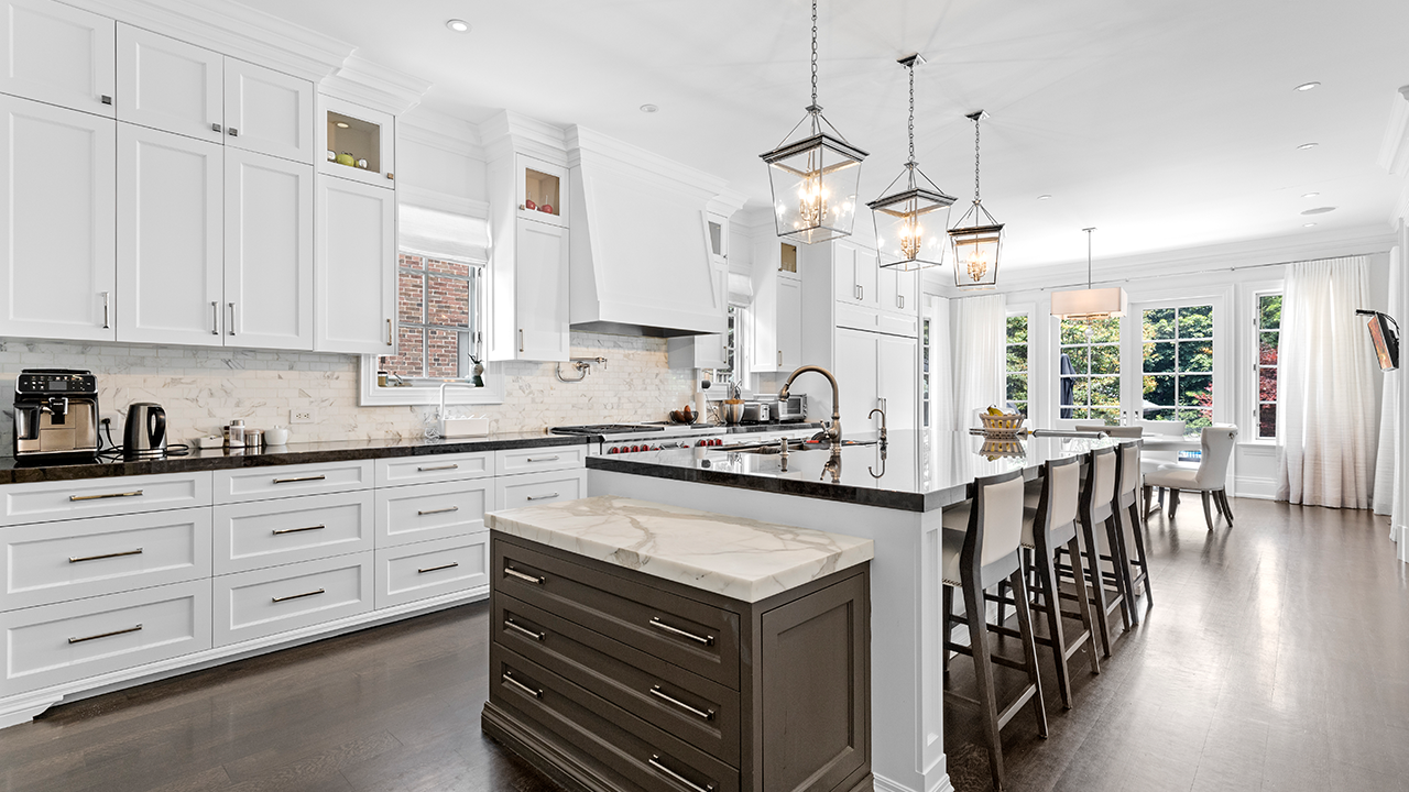 Large kitchen of a luxury home. Professional real estate photography taken by Terracon Media