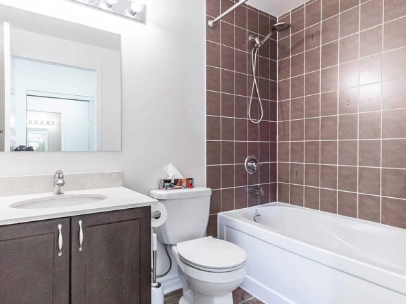 The bathroom of 3865 Lake Shore Blvd West #303 - For Lease in Etobicoke.