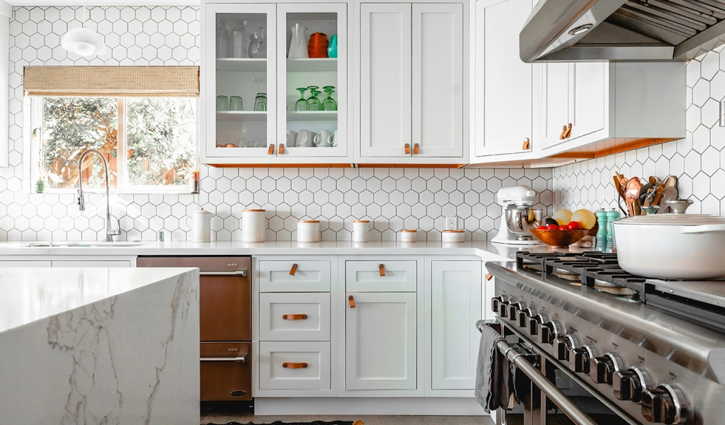 An image of a home's kitchen taken by a professional real estate photographer which is a great way on how to make your real estate listing stand out.