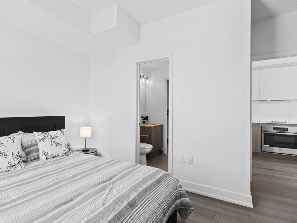 Bedroom looking into the bathroom of 8 Ann Street #308 located in Port Credit, Mississauga.