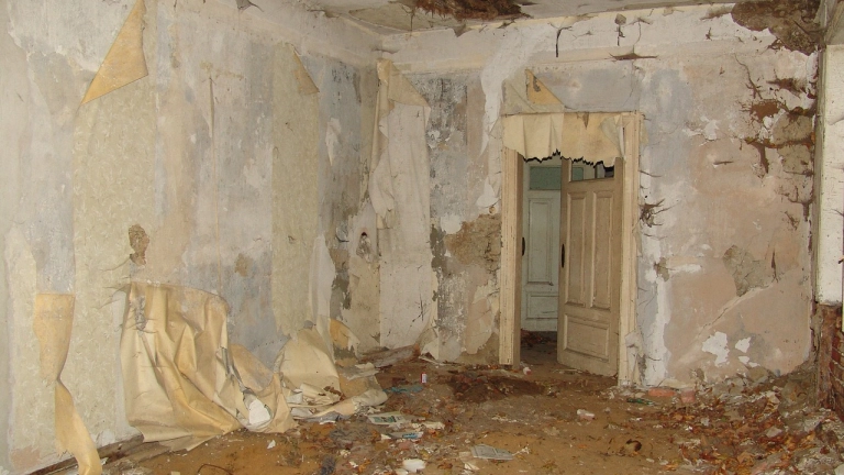 An interior image of a home that is completely destroyed.