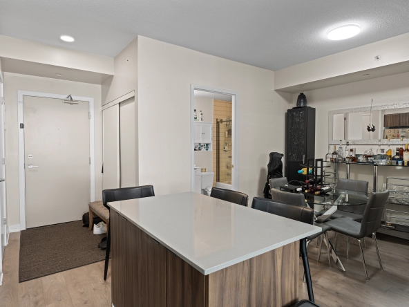 Front entrance + den + bathroom of 1117 Cooke Boulevard unit A107 located in the LaSalle neighbourhood of Burlington, Ontario, Canada. The unit is available for lease by Burlington rental agent, Marco Pedri.