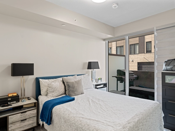 Primary bedroom of 1117 Cooke Boulevard unit A107 located in the LaSalle neighbourhood of Burlington, Ontario, Canada. The unit is available for lease by Burlington rental agent, Marco Pedri.