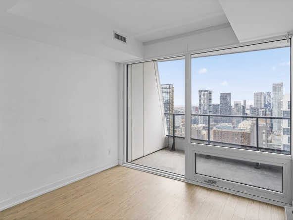 View from primary bedroom of 85 Wood Street unit 3717 - a 2 bedroom, 1 bathroom unit for lease in Toronto listed by Toronto Rental Agent Marco Pedri.