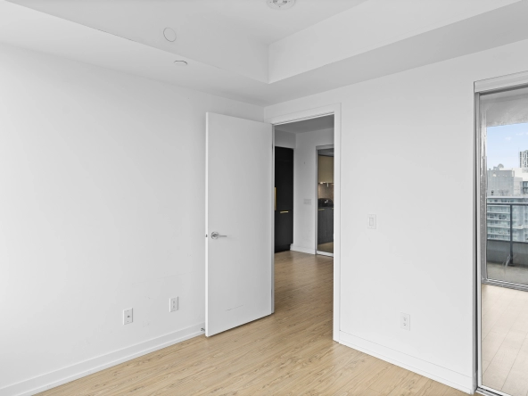 Primary bedroom of 85 Wood Street unit 3717 - a 2 bedroom, 1 bathroom unit for lease in Toronto listed by Toronto Rental Agent Marco Pedri.