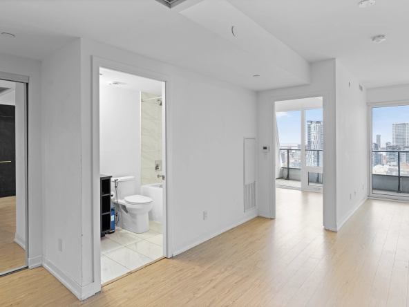 View of open-concept layout of 85 Wood Street unit 3717 - a 2 bedroom, 1 bathroom unit for lease in Toronto listed by Toronto Rental Agent Marco Pedri.