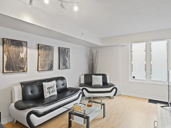 Living room of 96 Strachan Avenue located in the neighbourhood of Liberty Village in Toronto, Ontario currently listed for lease by Liberty Village real estate agent Marco Pedri.