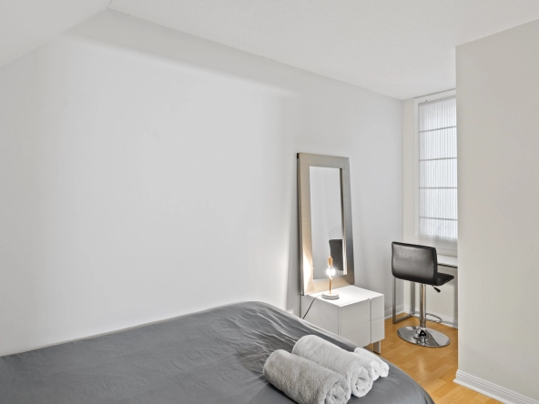 Second bedroom of 96 Strachan Avenue located in the neighbourhood of Liberty Village in Toronto, Ontario currently listed for lease by Liberty Village real estate agent Marco Pedri.