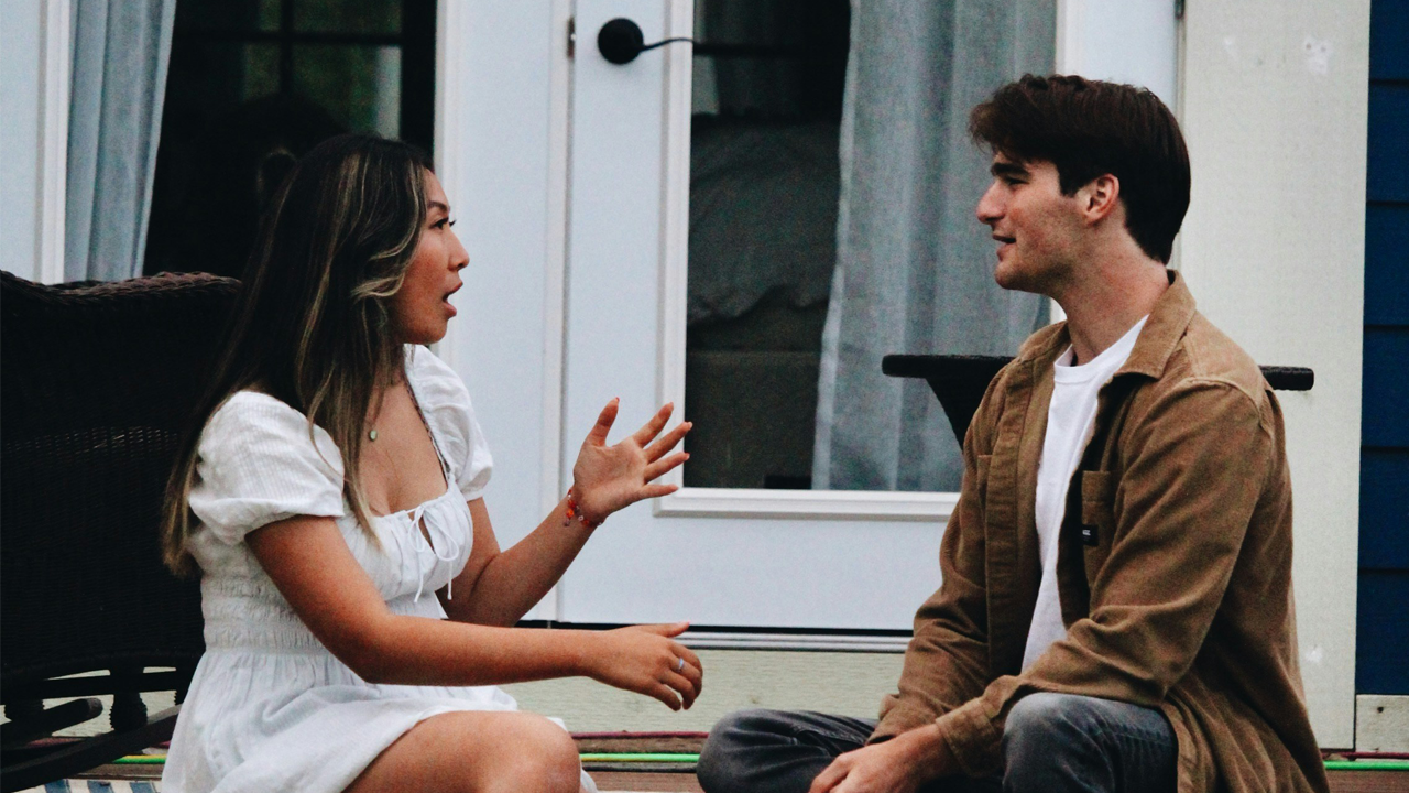 People talking and asking questions.