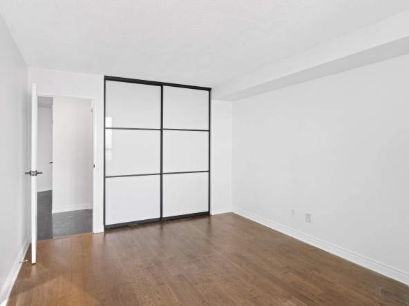 Primary bedroom closet located at 250 Queens Quay West unit 1208 - a Toronto condo for rent by real estate broker and Toronto rental agent Marco Pedri.