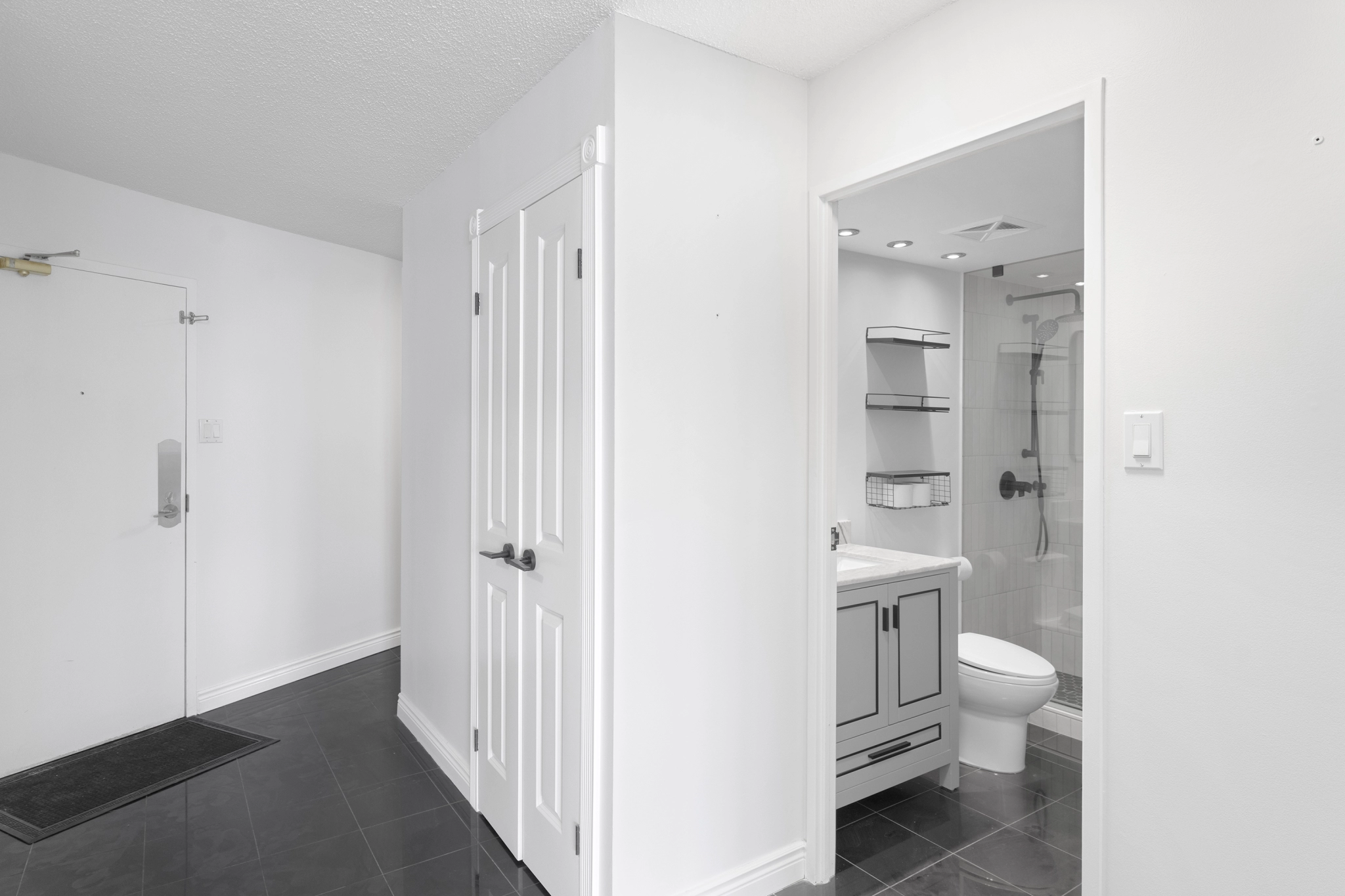 Hallway located at 250 Queens Quay West unit 1208 - a Toronto condo for rent by real estate broker and Toronto rental agent Marco Pedri.