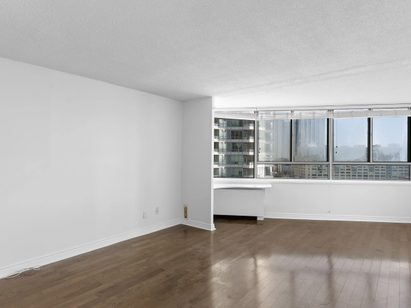 Living room located at 250 Queens Quay West unit 1208 - a Toronto condo for rent by real estate broker and Toronto rental agent Marco Pedri.