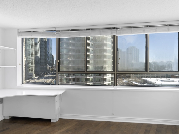 Living room windows located at 250 Queens Quay West unit 1208 - a Toronto condo for rent by real estate broker and Toronto rental agent Marco Pedri.