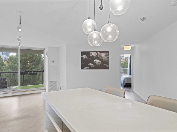 Kitchen overlooking living room of 77 Maitland Place unit 525 located in Toronto, Ontario, Canada - a condo currently for lease by Toronto rental agent Marco Pedri.