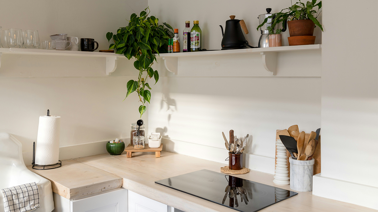 An image of a small, boutique kitchen in a rental apartment.