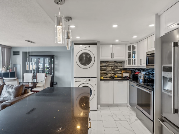 Kitchen and laundry of 3695 Kaneff Crescent SPH11 located in Mississauga, Ontario, Canada - a condo listed for lease by Marco Pedri - Broker with Shoreline Realty Corp., Brokerage