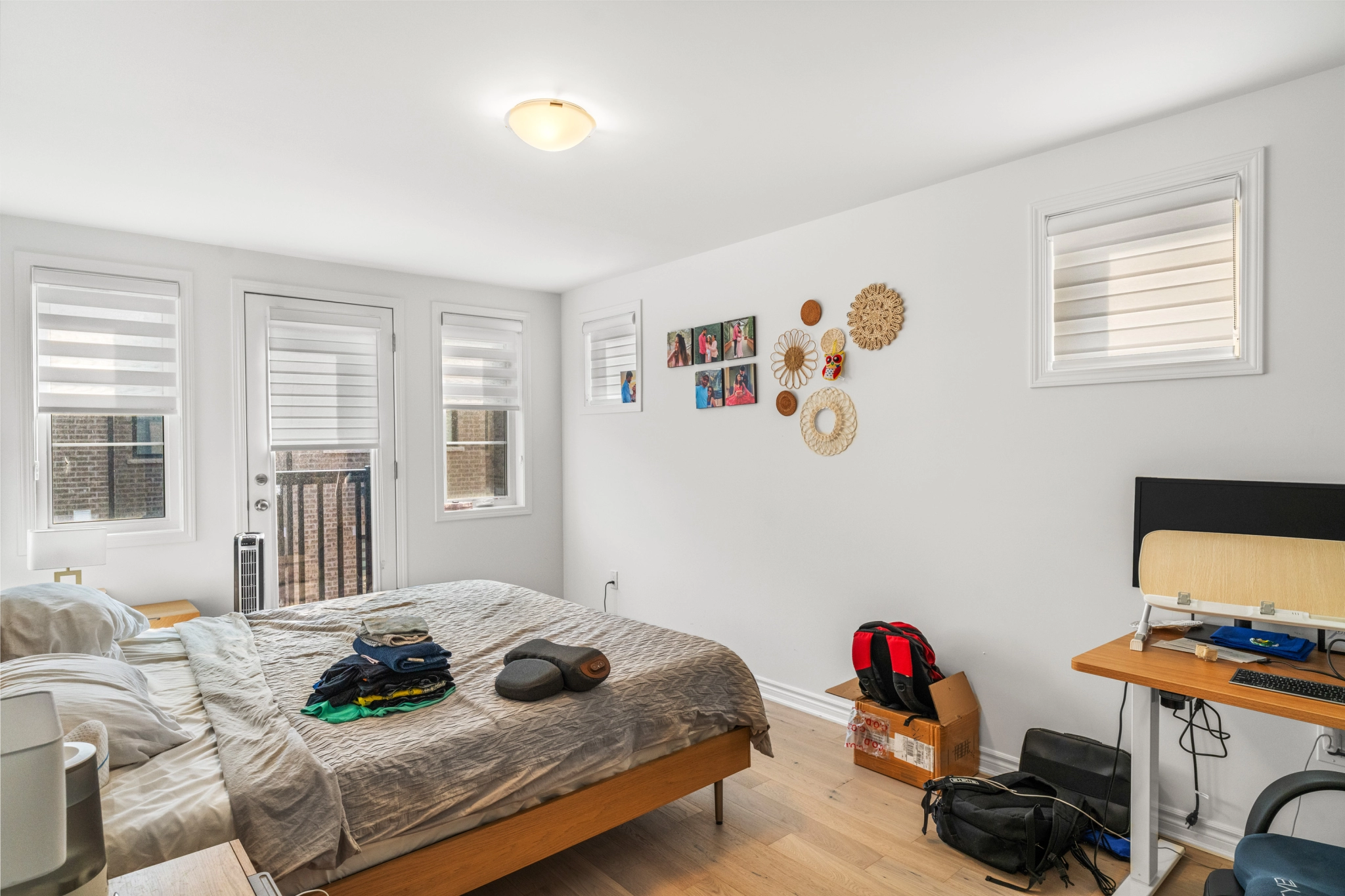 Primary bedroom located at 3104 William Cutmore Boulevard in Oakville, Ontario listed for lease by Oakville rental agent Marco Pedri.