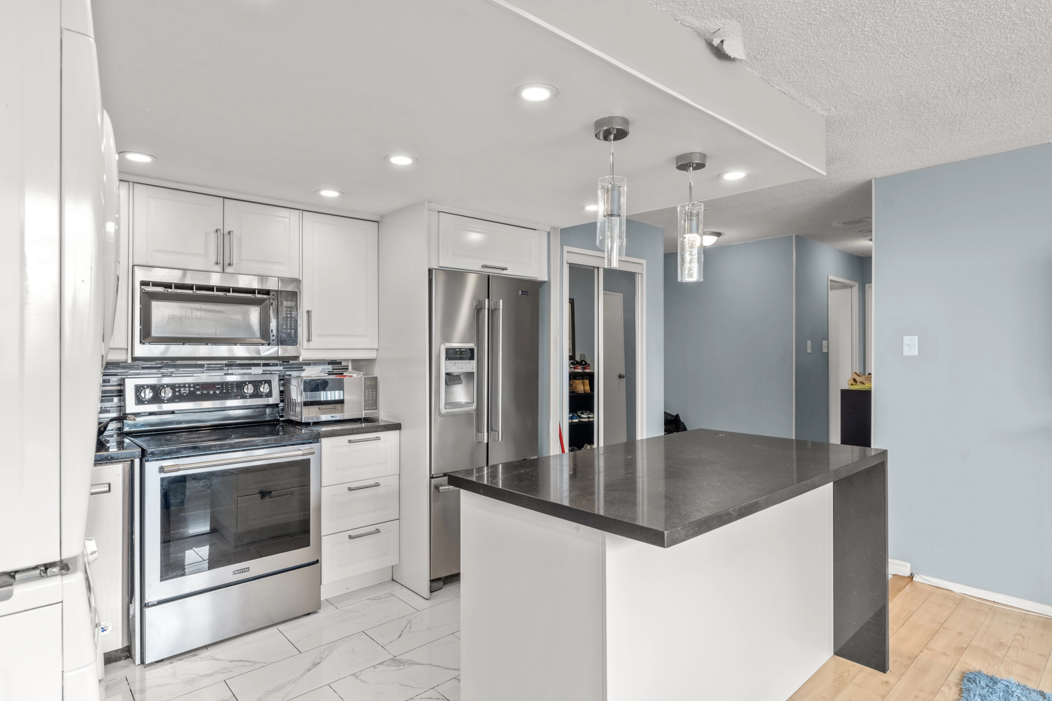 The interior design layout of a kitchen owned by a young homeowner.