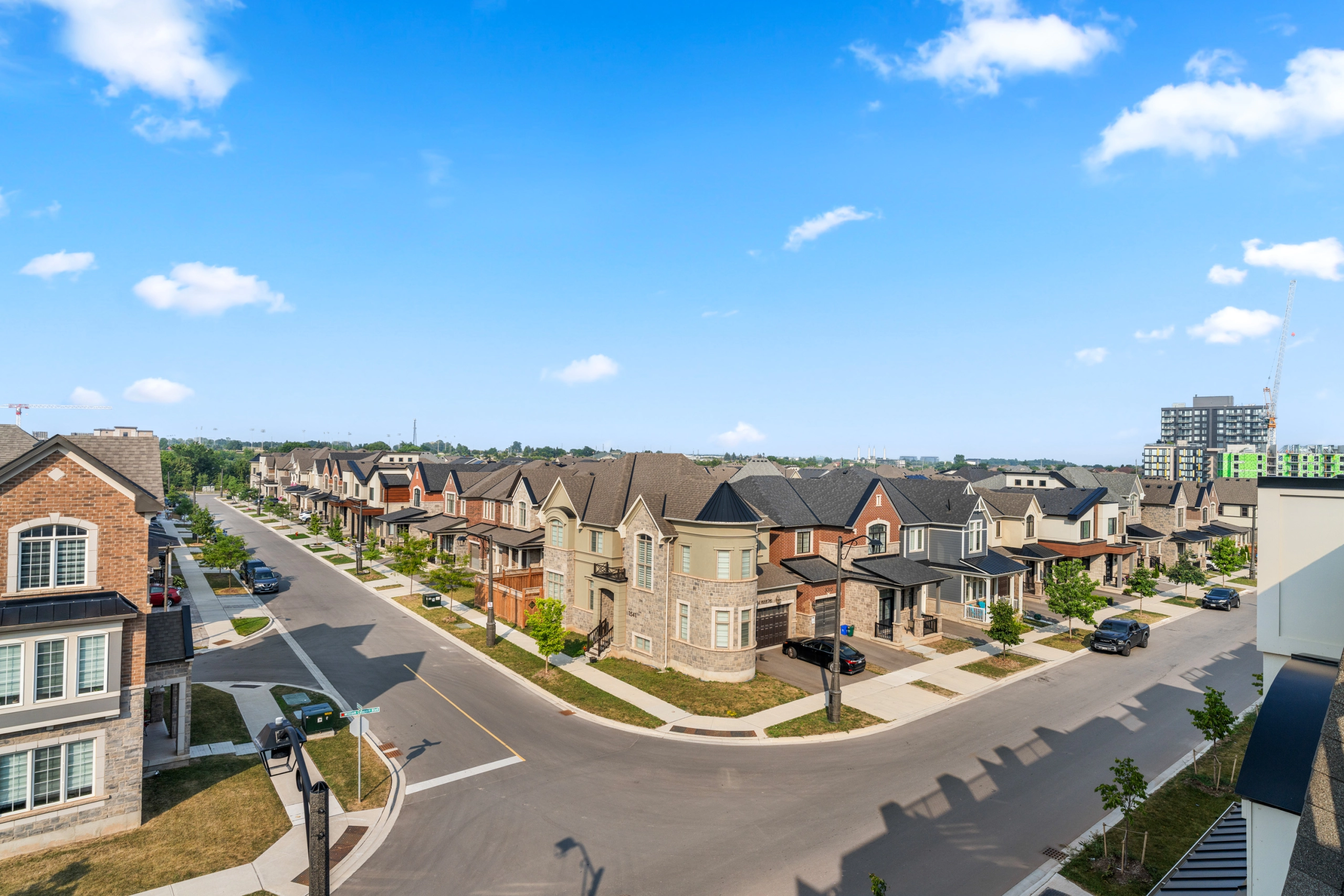An image overlooking a subdivision of homes.